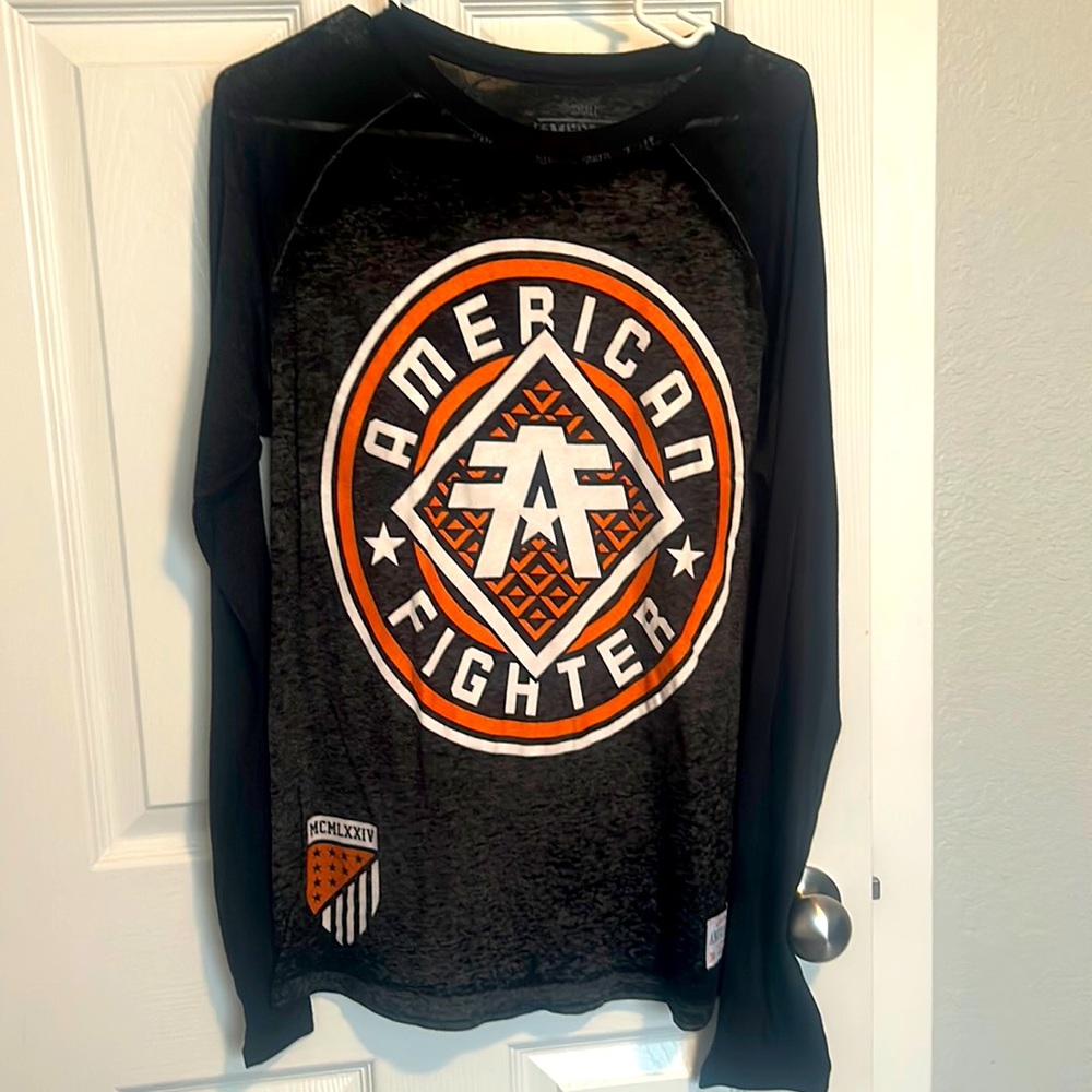 Long sleeve  tee good condition both sides graphics